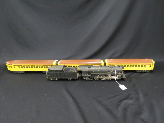 Appraisal: American Flyer Tin Passenger Train Set engine with trailer and