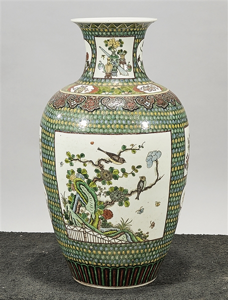 Appraisal: Tall Chinese enameled porcelain vase with trees and flowers motifs