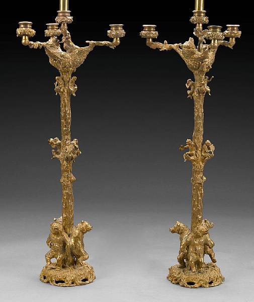 Appraisal: A pair of Continental gilt bronze figural four light candelabra