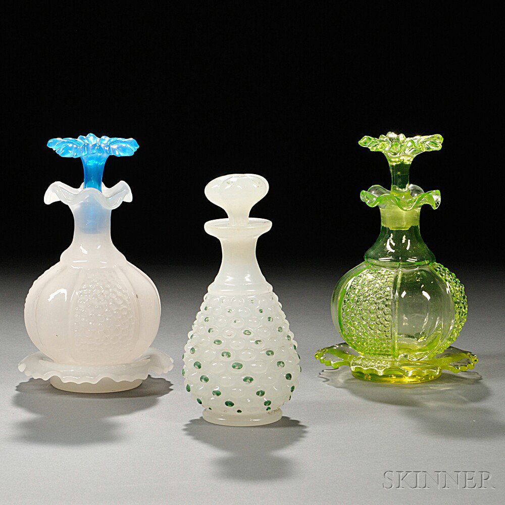 Appraisal: Three Blown-molded Glass Colognes probably th century Boston Sandwich Glass