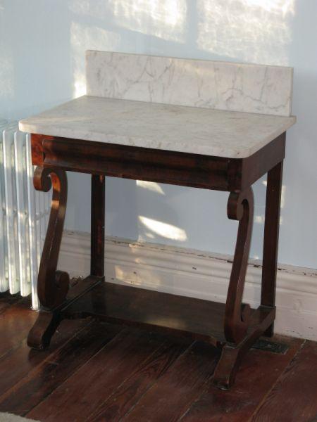 Appraisal: Empire Mahogany Veneer Washstand American ca poplar and white pine