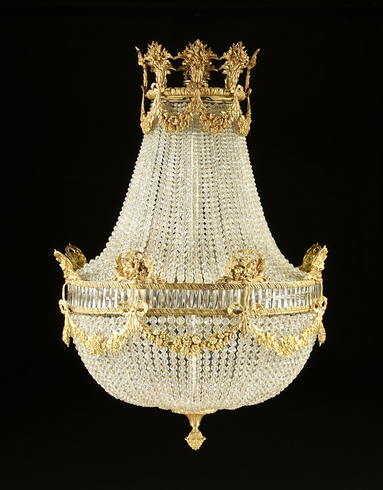 Appraisal: A STUNNING REGENCY STYLE GILT BRONZE AND CRYSTAL BEADED CHANDELIER