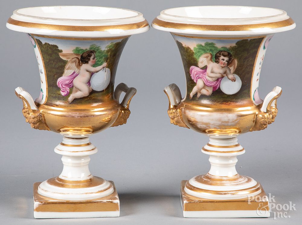 Appraisal: Pair of Paris porcelain urns th c Pair of Paris