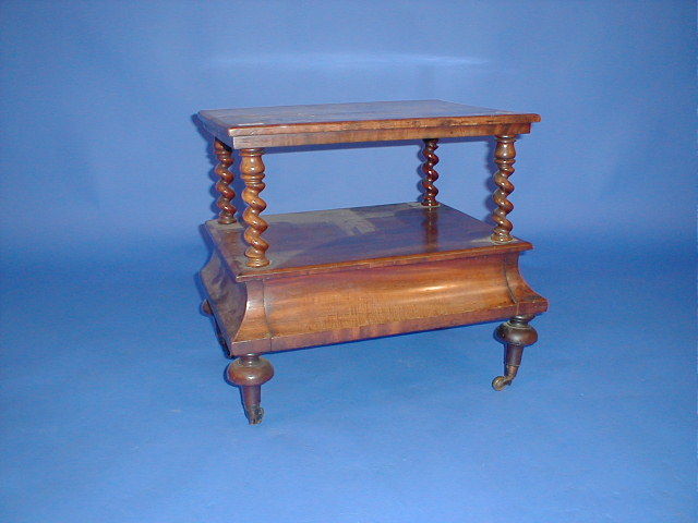 Appraisal: A Victorian mahogany two tier whatnot with barley twist supports