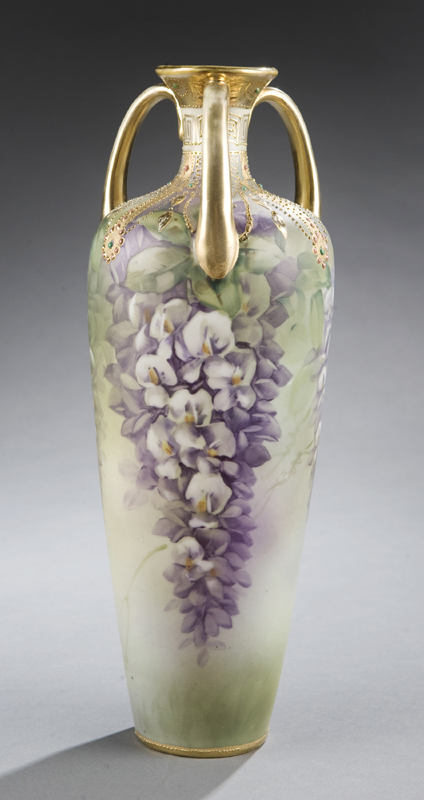 Appraisal: Three handle Nippon wisteria vase Matte painting with hanging wisteria