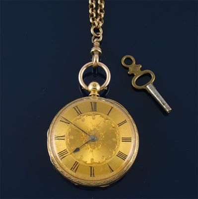 Appraisal: A gold open faced fob watch On a gold circular