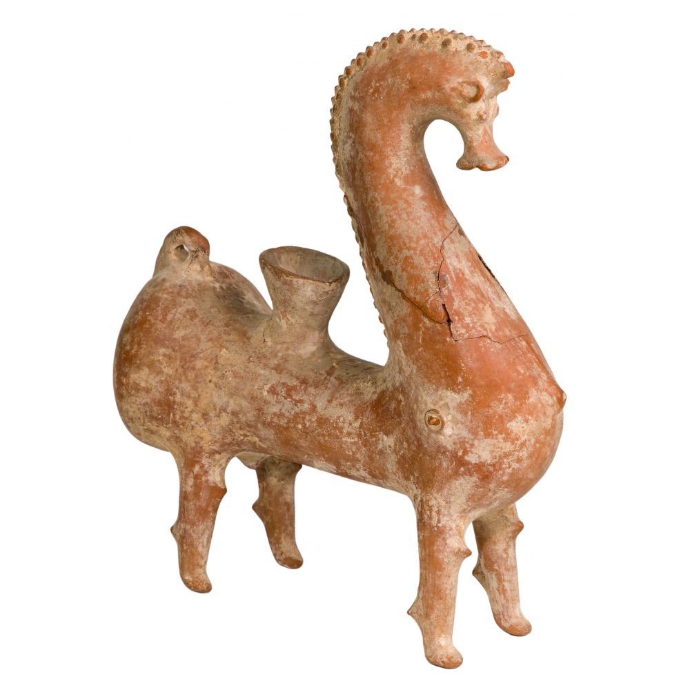 Appraisal: PERSIAN AMLASH CERAMIC HORSE VESSELHaving stylized details throughout including on