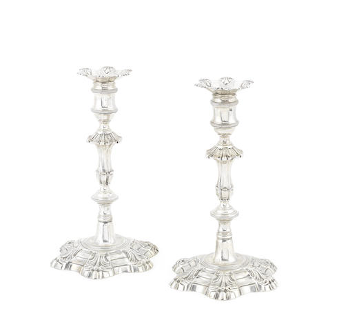 Appraisal: A pair of George II cast silver candlesticks by John