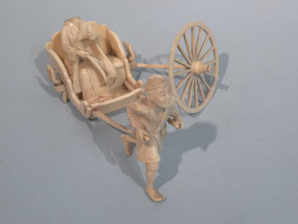 Appraisal: A late thC Japanese carved ivory rickshaw incomplete cm wide