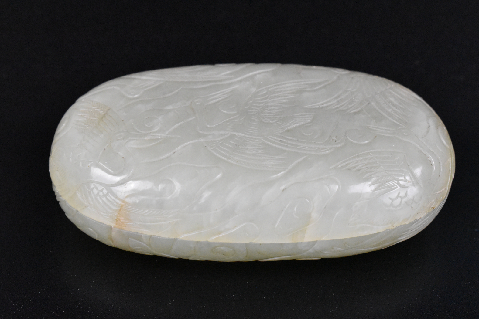 Appraisal: A Chinese jade carved covered box with crane design Oval