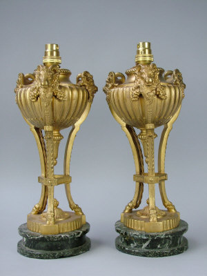 Appraisal: A pair of French Empire style gilt metal table lights