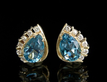 Appraisal: A Pair of Diamond and Blue Topaz Earrings k yellow