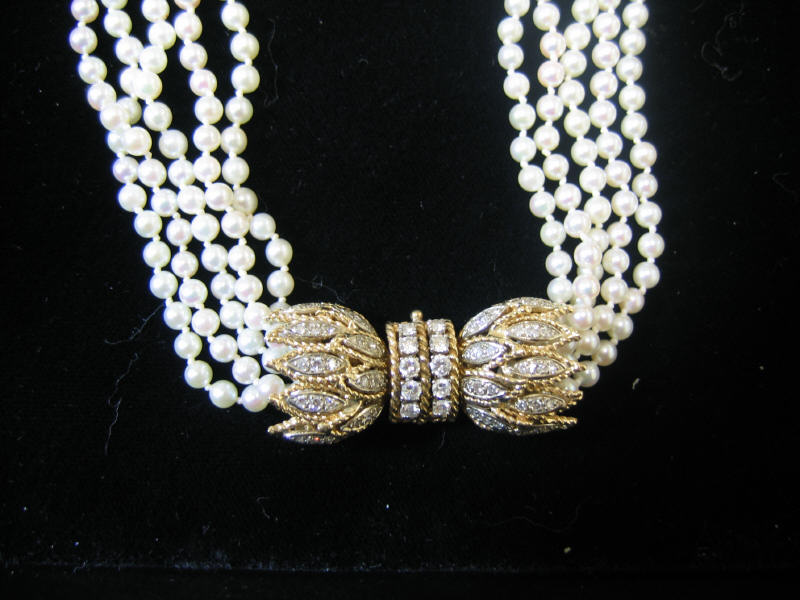 Appraisal: FIVE STRAND PEARL NECKLACE mm cultured pearls with cream and