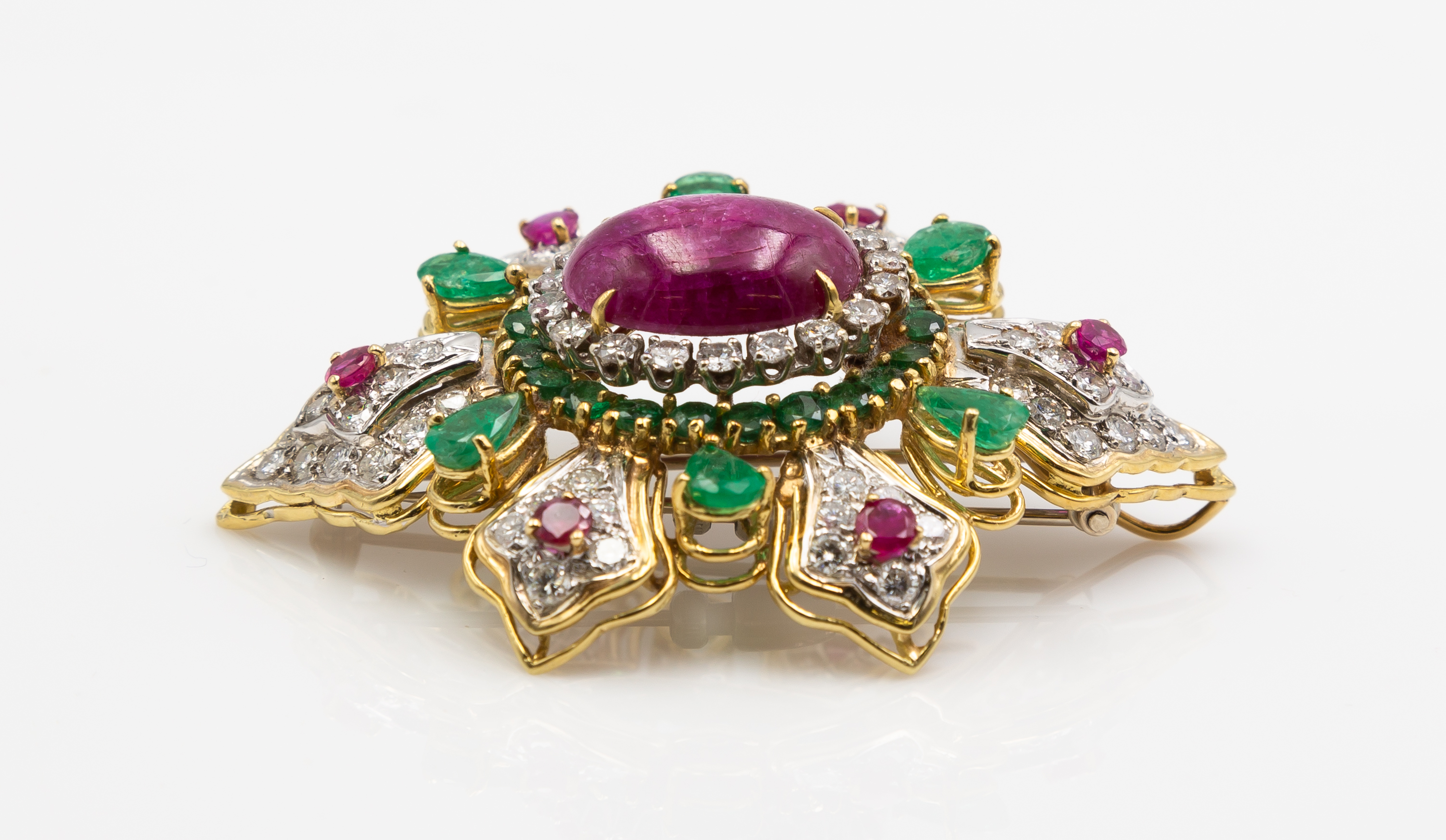 Appraisal: K GOLD DIAMOND EMERALD RUBY AND CABOCHON CLIP BROOCH An