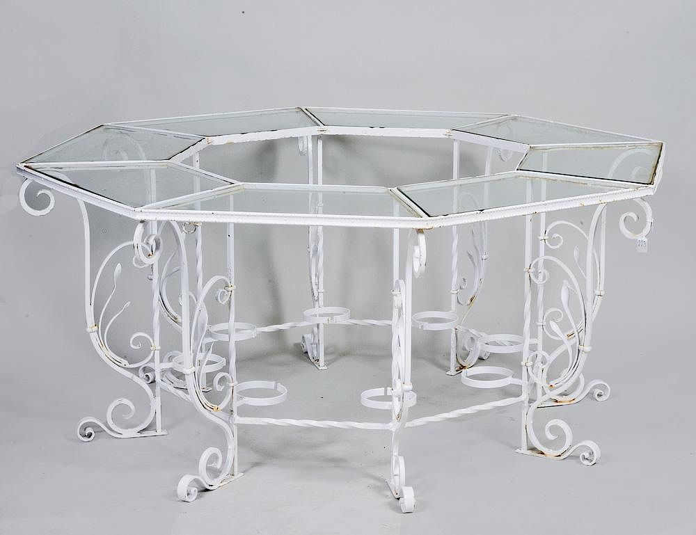 Appraisal: OCTAGONAL PAINTED METAL PATIO TABLE With glass panels raised on