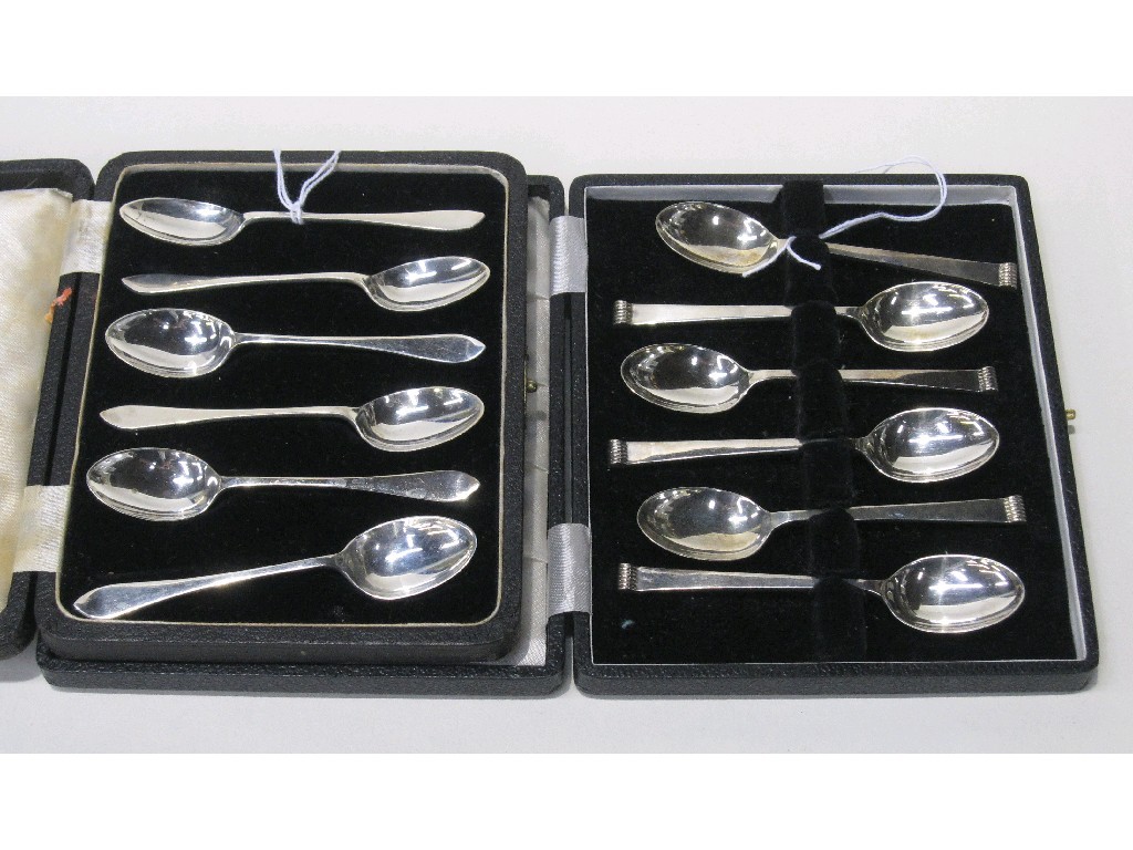 Appraisal: Lot comprising two cased sets of six silver spoons Sheffield