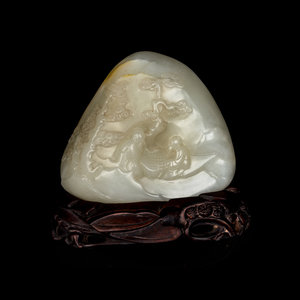 Appraisal: A Chinese White and Russet Jade Boulder carved with scholars