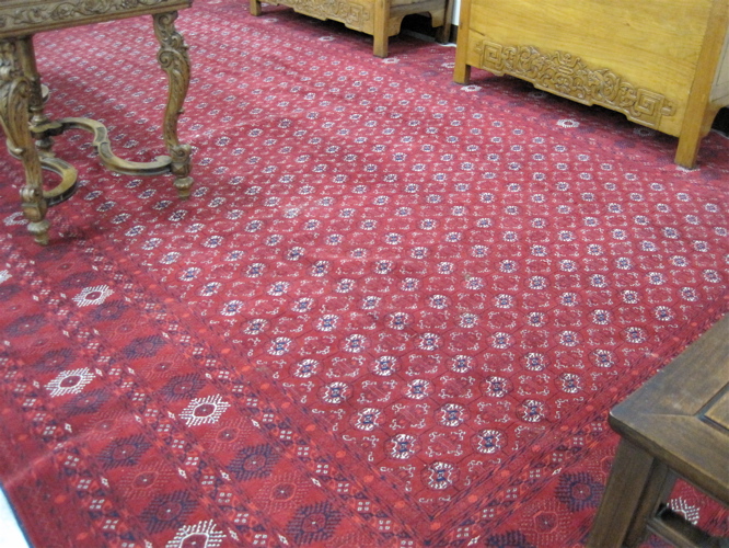 Appraisal: AFGHANI TURKOMAN CARPET overall repeating columns of small Turkoman gols