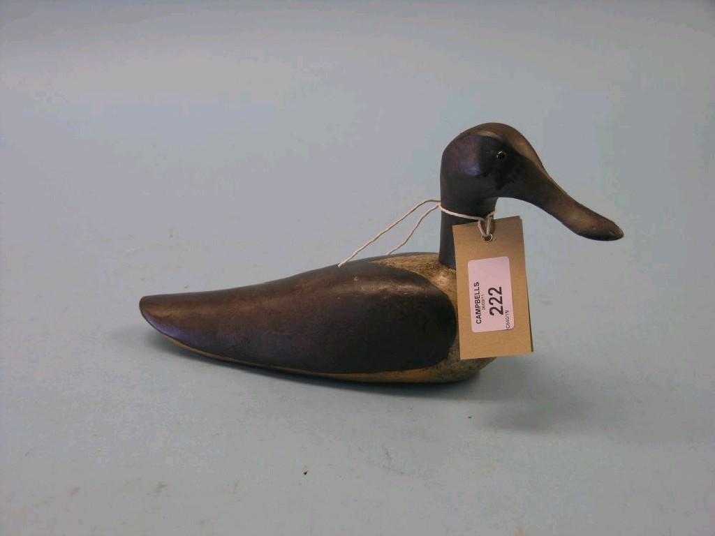 Appraisal: A painted wood decoy duck in