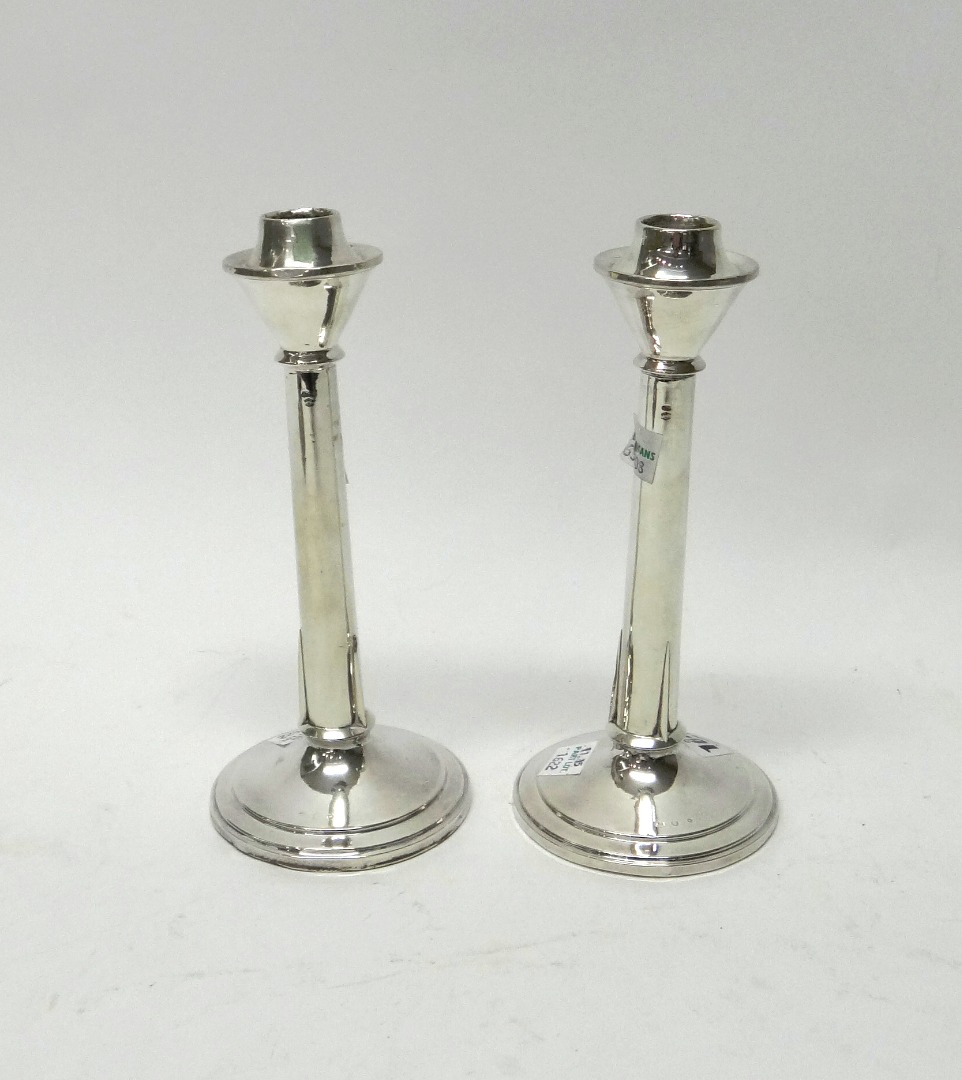 Appraisal: A pair of European table candlesticks in an Art Deco