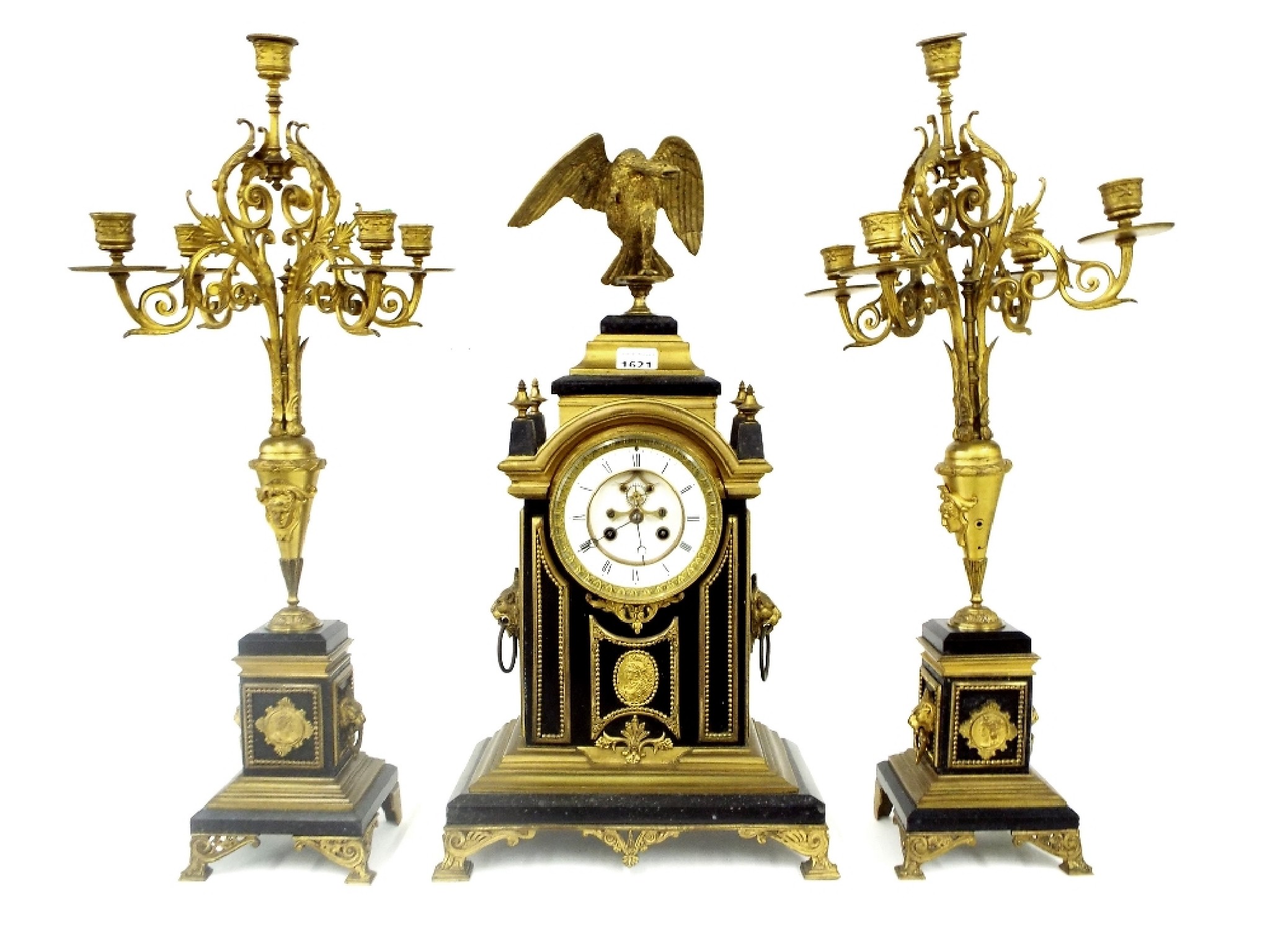 Appraisal: French black marble and ormolu mounted two train mantel clock