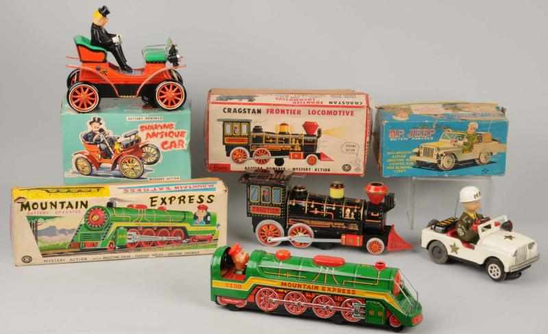 Appraisal: Lot of Battery-Operated Toys Description Japanese Working Includes two Train