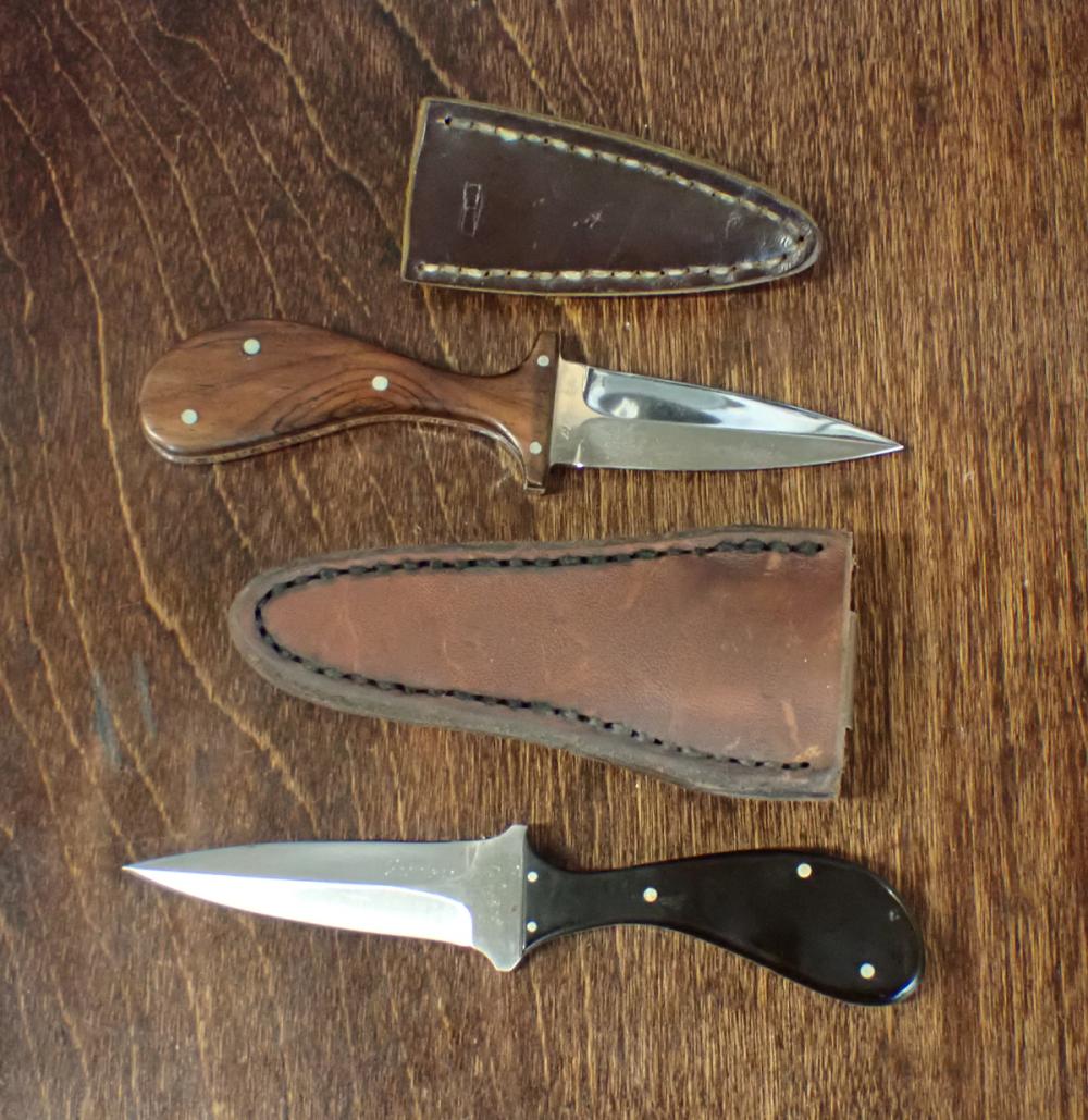 Appraisal: TWO CRAWFORD BOOT KNIVES the first marked double sided blade