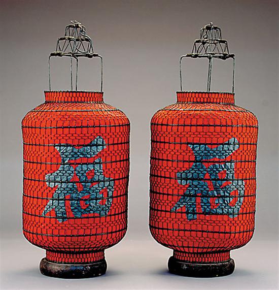 Appraisal: Pair Chinese lanterns metal mesh frame lined with red cloth