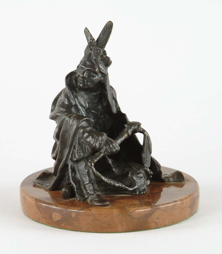 Appraisal: CARL KAUBA Austrian - SEATED INDIAN Bronze figure of an