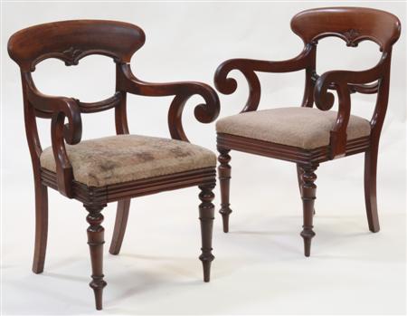 Appraisal: A pair of Victorian mahogany carvers each with arched top