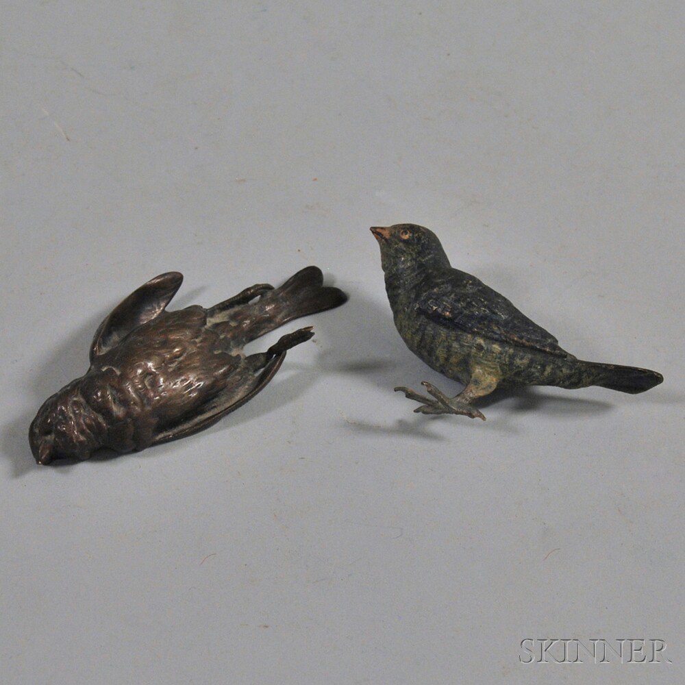 Appraisal: Two Bronze Figures of Birds a polychrome painted figure of