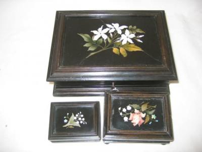 Appraisal: A PIETRA DURA BOX of panelled oblong form the lids