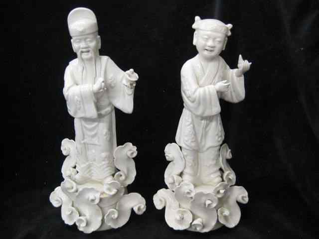 Appraisal: Pair of Chinese Porcelain Figurines '' tall immortals on clouds