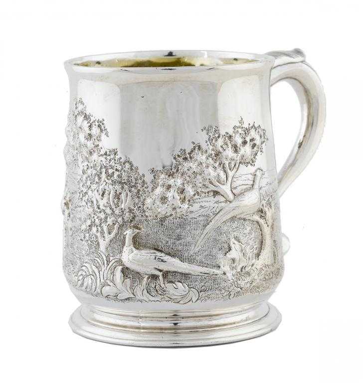 Appraisal: A GEORGE II MUG later chased with pheasants in a