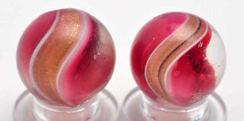 Appraisal: Lot of Ribbon Lutz Swirl Marbles Description Includes a pair