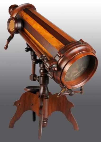 Appraisal: Large Wooden Kaleidoscope Description Mahogany and oak wood Complete Needs