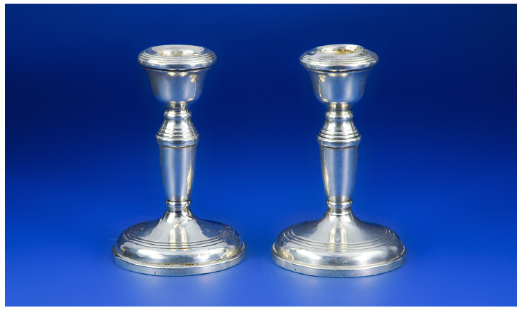 Appraisal: Pair Of Small Silver Candlesticks Circular Spreading Base Height Inches