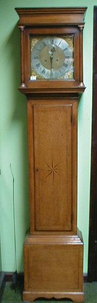 Appraisal: An early thC light oak longcase clock with moulded and