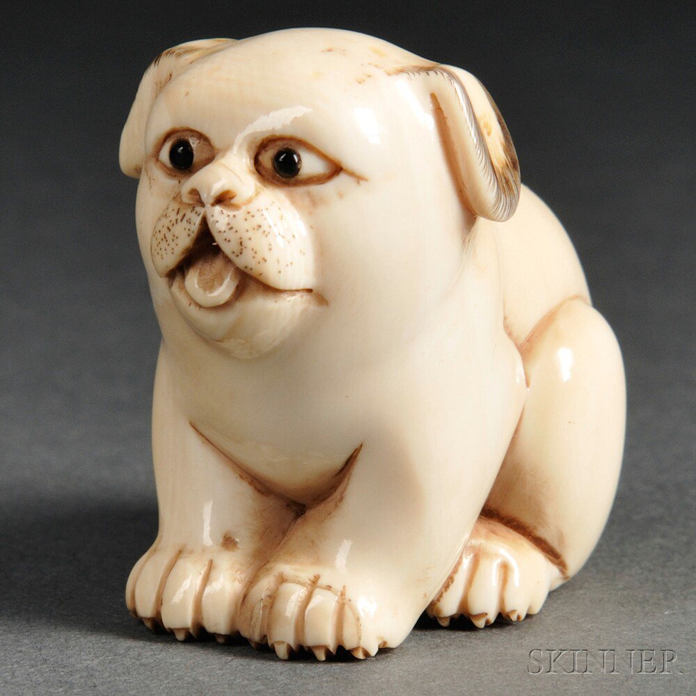 Appraisal: Ivory Netsuke of a Dog Japan th th century sitting