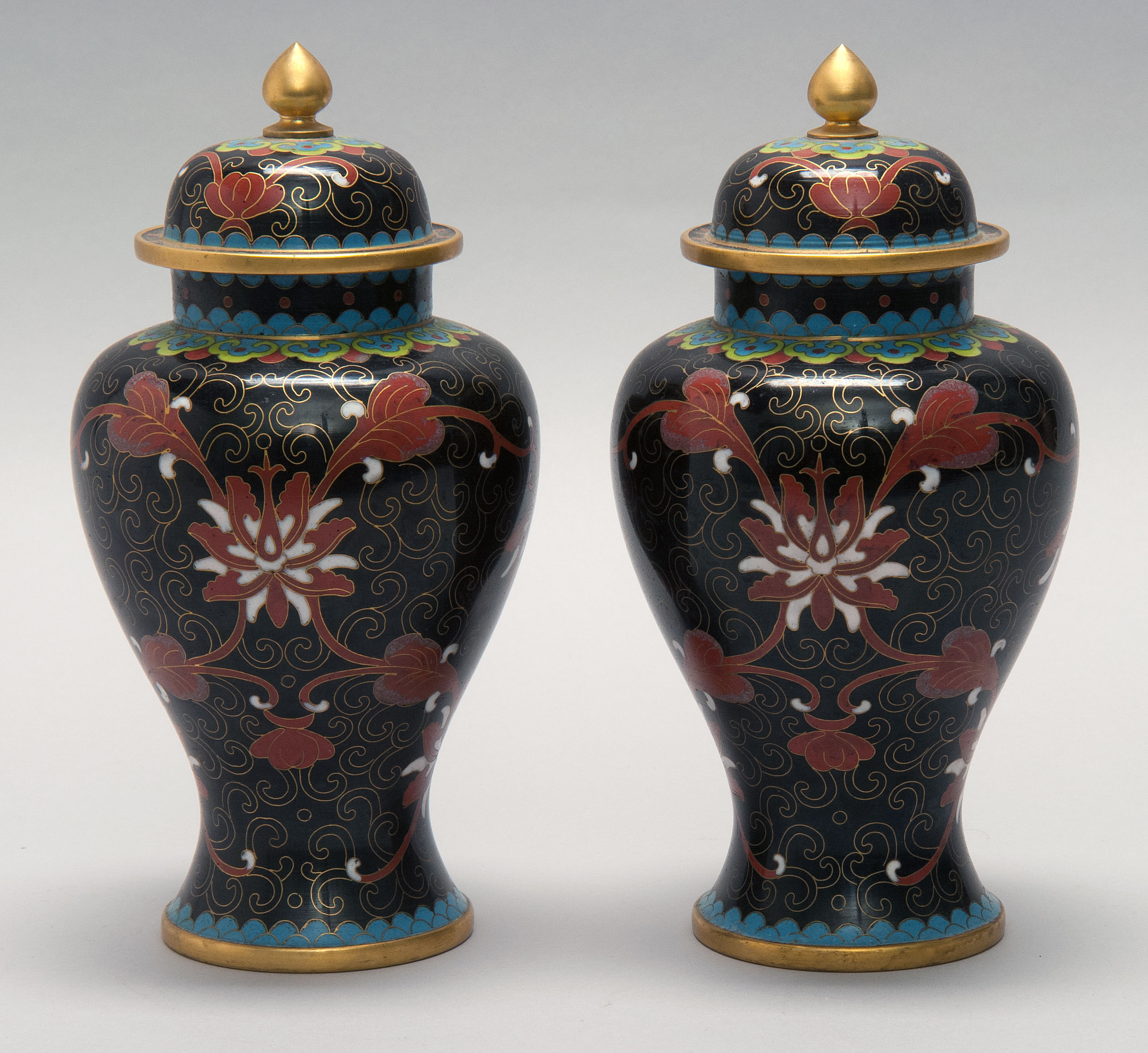 Appraisal: PAIR OF CLOISONN ENAMEL VASES In temple jar form with