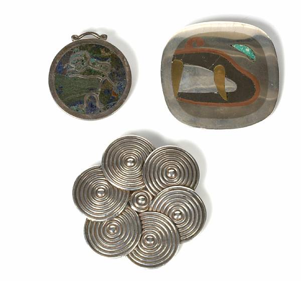 Appraisal: A collection of three silver metals and stone brooches Los