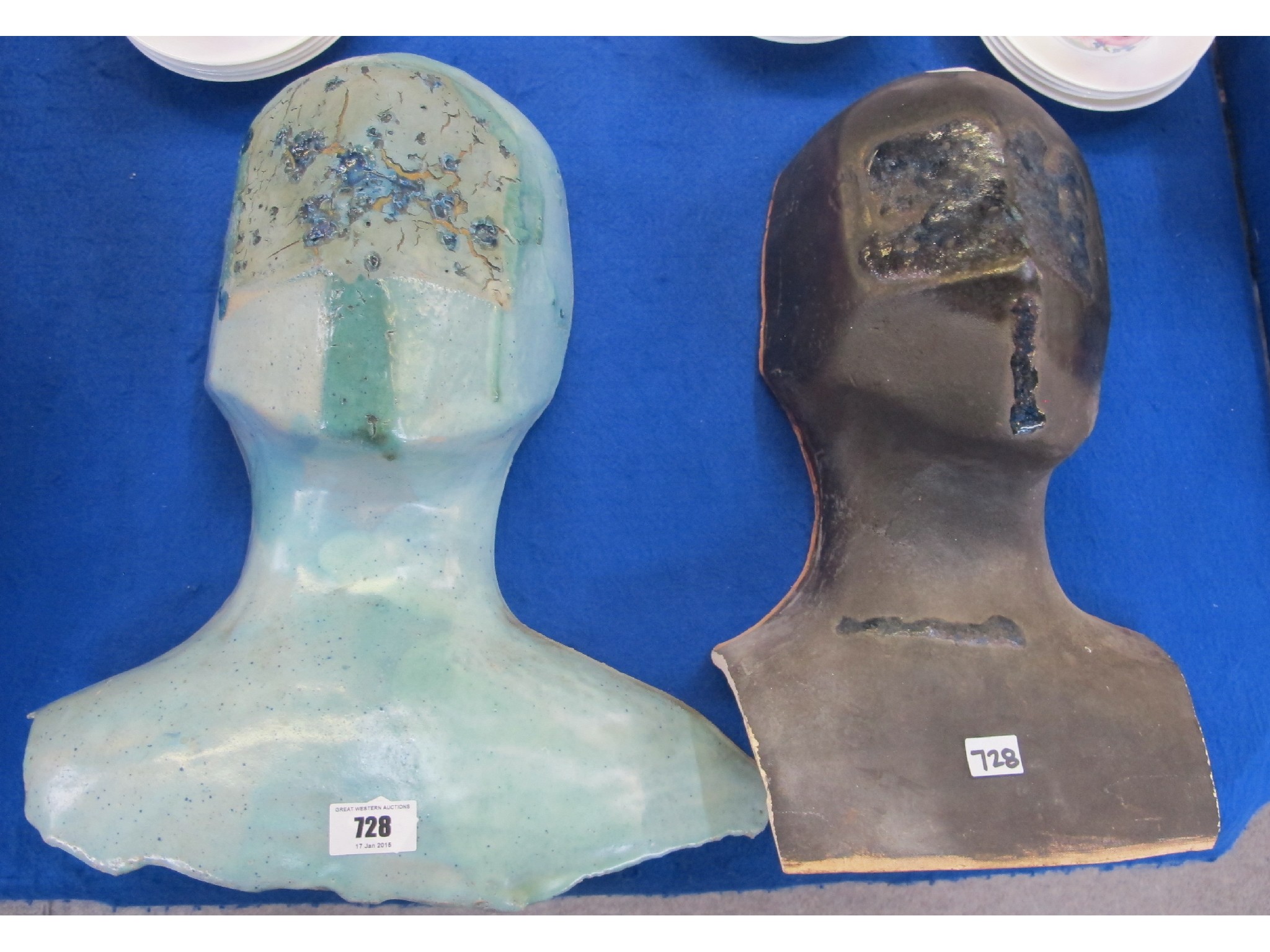 Appraisal: Two pottery masks