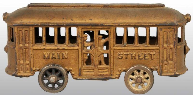 Appraisal: Cast Iron Main Street Trolley Still Bank Description Manufactured by