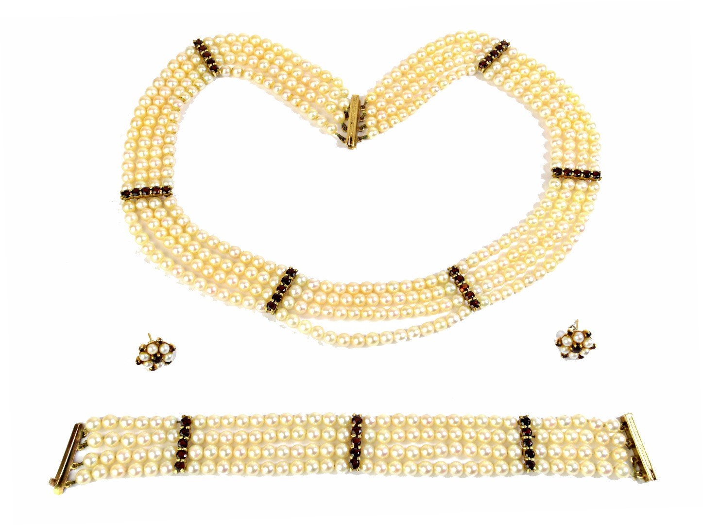 Appraisal: A gold mounted cultured pearl and garnet set collar necklace