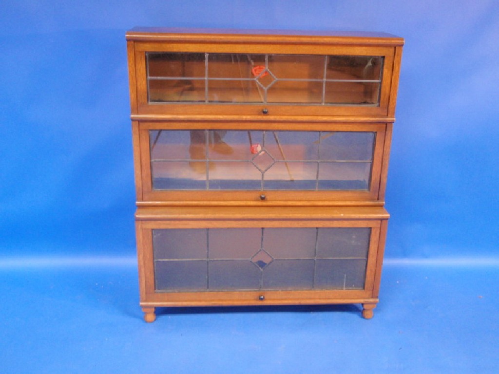 Appraisal: A Hillhead sectional bookcase by Peters Graham Glasgow cm wide