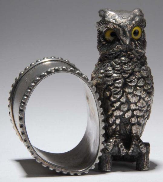 Appraisal: Owl with Glass Eyes Figural Napkin Ring Description A large