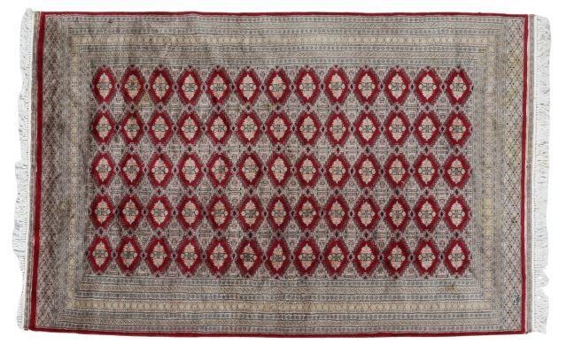 Appraisal: Hand-tied Pakistani Bokhara rug separation tear at edge binding approx