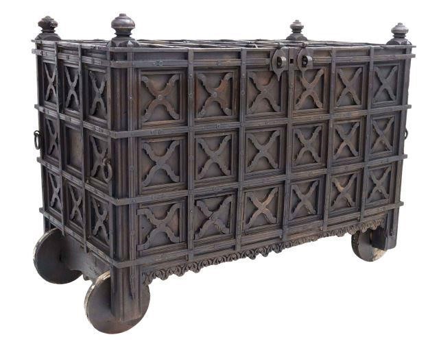 Appraisal: Metal-bound teakwood dowry chest India th c turned finials hinged