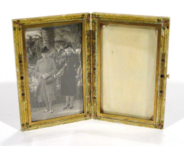 Appraisal: Folding rectangular bone twin divisional photo frame the exterior painted