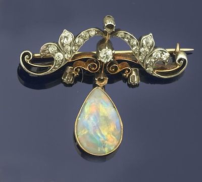 Appraisal: An Edwardian opal and diamond brooch The pear shaped solid